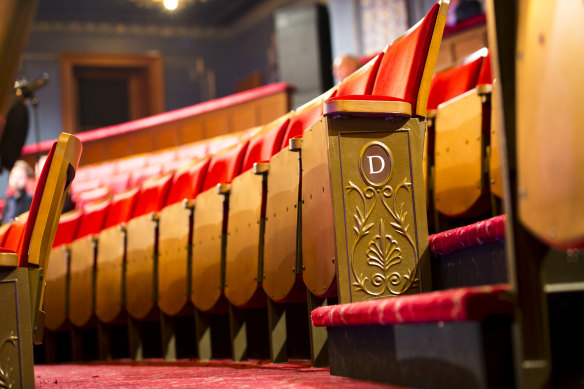 Custom-designed seats replace the theatre's notoriously-uncomfortable folding chairs.