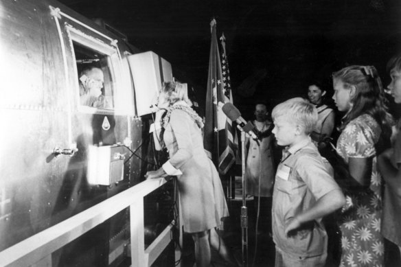 Joan Aldrin speaks with her husband, Buzz, via telephone patch during the quarantine period that followed Apollo 11's return to Earth..