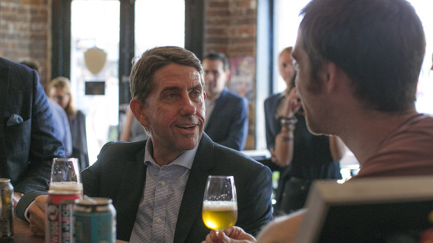 State Development Minister Cameron Dick tastes a beer with BrewDog co-founder Martin Dickie.