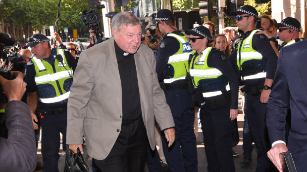Cardinal George Pell arrives at Melbourne Magistrates Court on Monday morning.