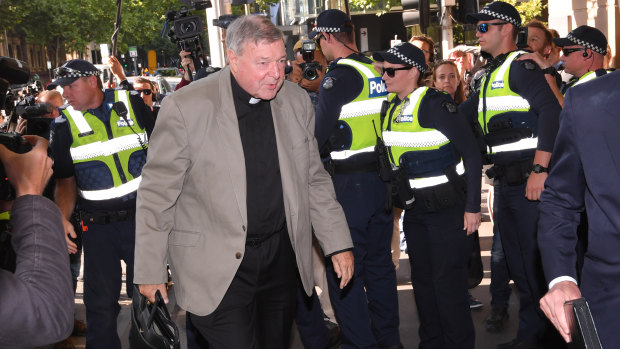 Cardinal George Pell arrives at Melbourne Magistrates Court on Monday morning.