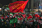 Pro-government demonstrators gather at a square in Tehran, Friday, July 17, 2026.