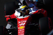 Hamilton sits in his car during qualifying.