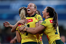 Australia celebrates a try.