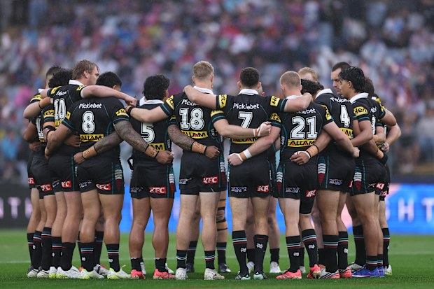 The Panthers stood arm in arm before the preliminary final.