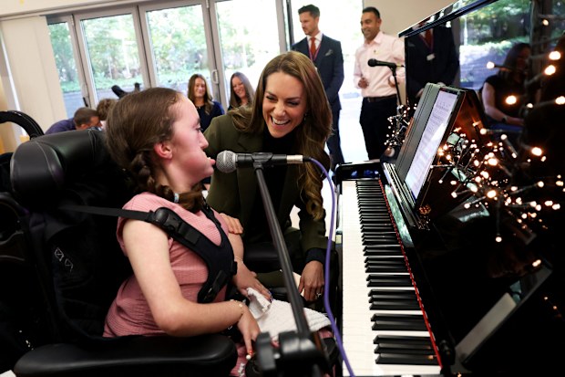 Catherine, Princess of Wales meets Charlotte Freegard during a music therapy session at The Treehouse Children’s Hospice 
