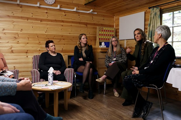 Kate, Princess of Wales, second from right, meets with family members at The Treehouse children’s hospice during a visit to learn about the care and support provided by EACH, in Ipswich, England, Thursday Oct. 22, 2026