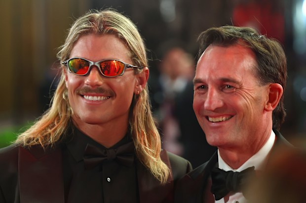 Bailey Smith of the Cats and Andrew Dillon, Chief Executive Officer of the AFL are seen during the 2025 Brownlow Medal 