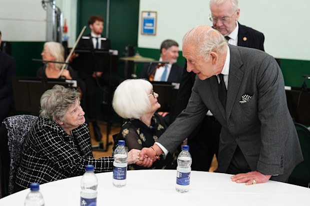 ing Charles III speaks with members of the Aberfan Wives Group at Aberfan and Merthyr Vale Community Centre, during a commemoration event to mark the 60th anniversary of the Aberfan disaster on October 21, 2026 in Merthyr Tydfil, Wales