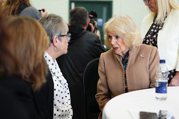 Queen Camilla speaks with members of the local community at Aberfan and Merthyr Vale Community Centre, during a commemoration event to mark the 60th anniversary of the Aberfan disaster on October 21, 2026 in Merthyr Tydfil, Wales.