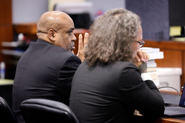 Duane Davis, left, and his attorney Michael Sanft listen to rebuttal closing arguments in the Duane Davis murder trial, related to the 1996 killing of rapper Tupac Shakur, in Clark County District Court at the Regional Justice Center in Las Vegas, Monday, Aug. 31, 2026. (Steve Marcus/Pool Photo via AP)