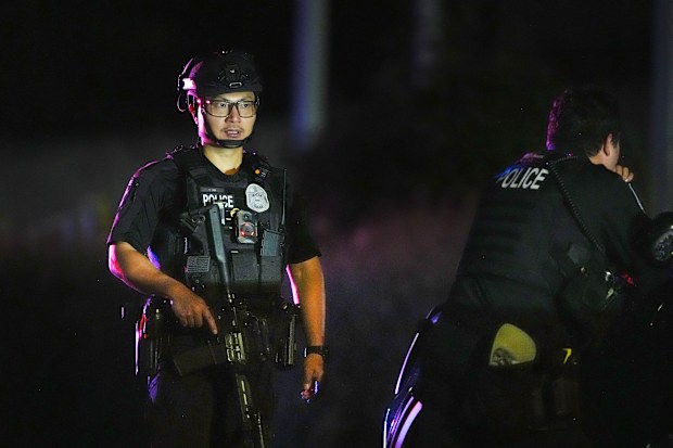 Seattle police respond to a shooting which killed two people.