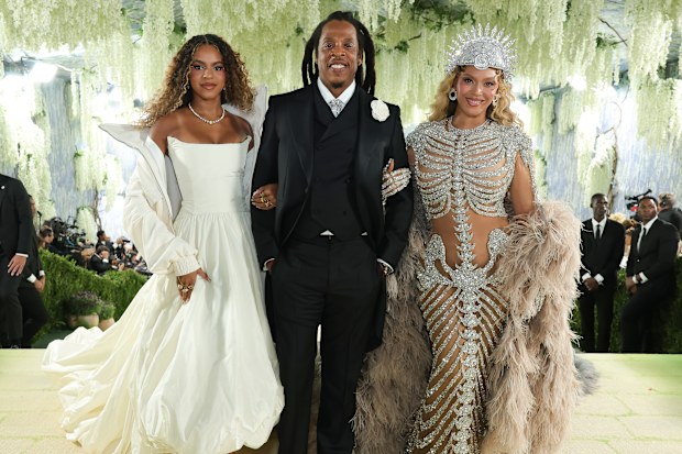 A family outing to the Met Gala in May: Blue Ivy Carter, Jay-Z and Beyoncé.