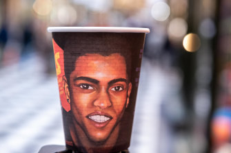 The coffee cup with the image of Tej Chitnis.