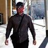 Jack Gibson-Burrell, accused of vandalising landmarks across Melbourne, left the courthouse dressed as Spiderman for his hearing on Thursday.