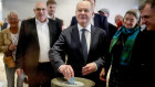 German Chancellor Olaf Scholz casts his ballot during a vote of confidence against him at the German parliament Bundestag.