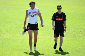 Collingwood’s Patrick Lipinski leaves the training track on Monday with a sore ankle.