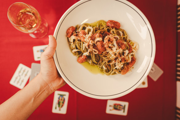 Toasted seaweed linguine with cuttlefish and confit tomato.