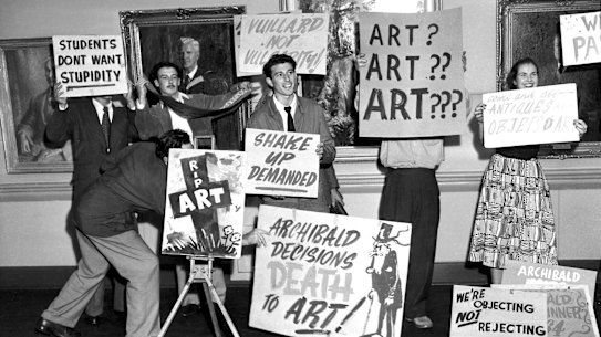 Art students at the Art Gallery of NSW, protest the awarding of the Archibald Prize to William Dargie for his portrait of Essington Lewis on January 24, 1953.