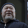 Ai Weiwei holds silent protest outside Julian Assange's extradition hearing