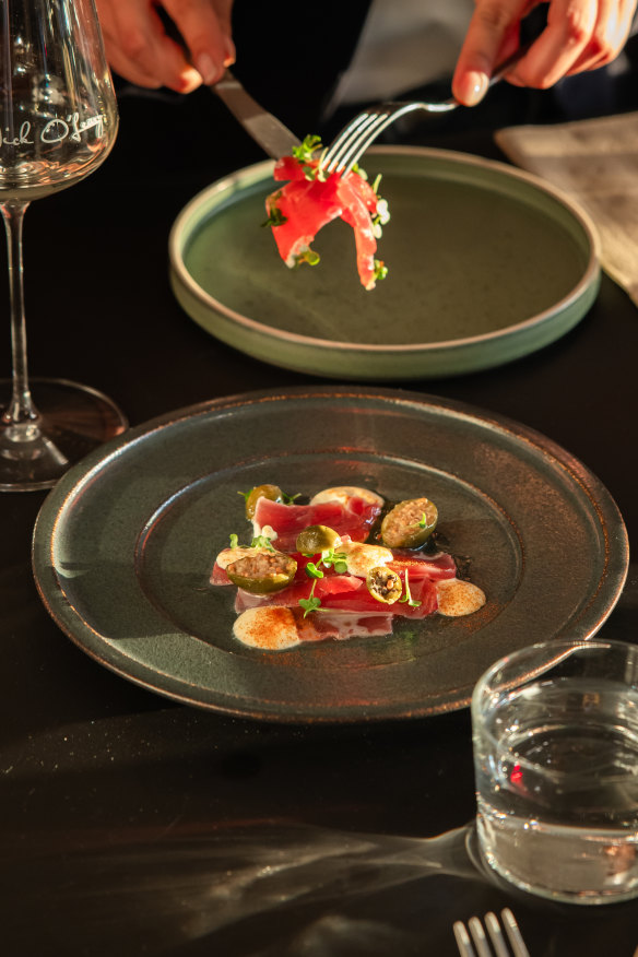 Tuna crudo with fermented capsicum mayo and caperberries.