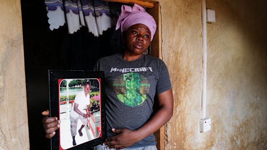 Teni Ghaatuon, mourns her husband, James Nbalebna, who died aged 21 from a mine blast by the Chinese mining company Shaanxi.