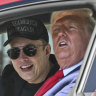 Elon Musk and Donald Trump in a Tesla at the White House.