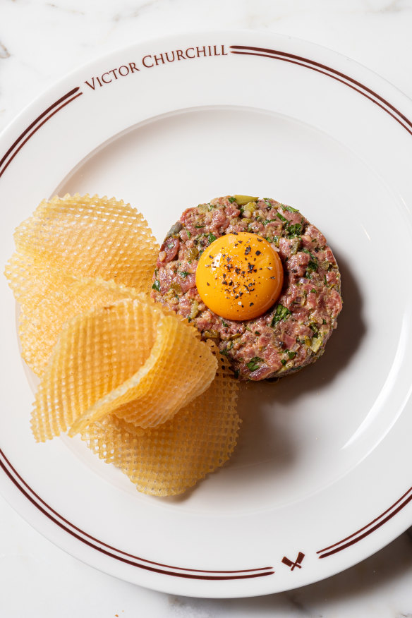 Steak tartare with crispy gaufrette chips.