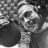 John Blackman, 1989: Radio and TV personality John Blackman in his voice over booth in the Nine studio for “Hey Hey It’s Saturday”. PICTURE: Mark Wilson.
