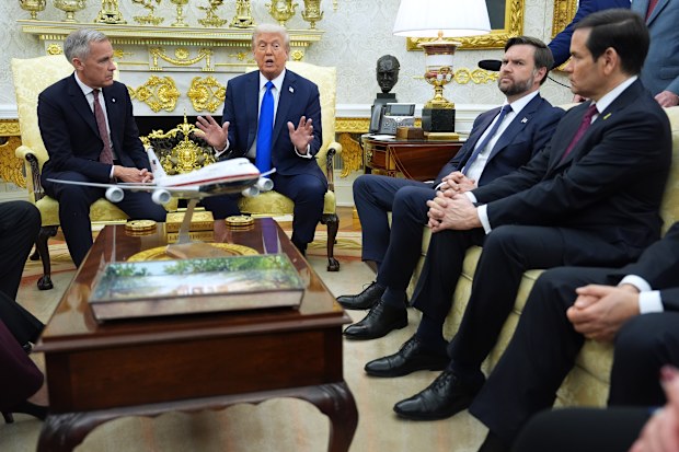 President Donald Trump and Canadian Prime Minister Mark Carney meet in the Oval Office of the White House,