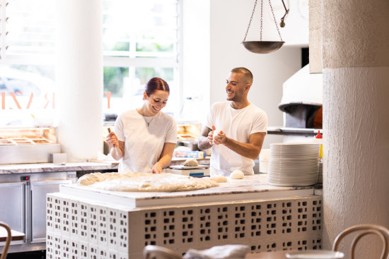 There are equal measures of Naples and Bondi in this convivial pizza and porchetta trattoria.