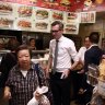 Liberals' bus stops in at Chinatown as 'racist' furore engulfs Labor