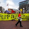 Protestors gather outside the UN Plaza in San Francisco. 