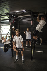 Newington College boys working out in the gym.