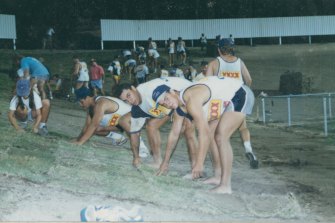 Members of the inaugural North Queensland Cowboys playing squad helped turf the spectator mounds.