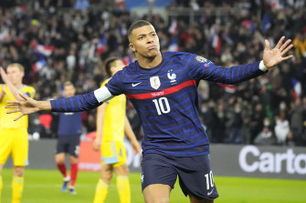 Kylian Mbappe celebrates scoring France’s third goal.