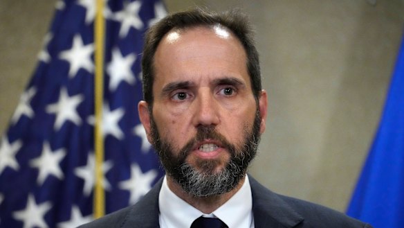 Special counsel Jack Smith addresses media on Friday. 