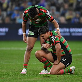 Latrell Mitchell is consoled after full-time on Friday.