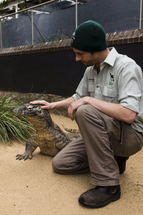 Reptile Keeper Stuart Kozlowski with Naga the Komodo dragon.