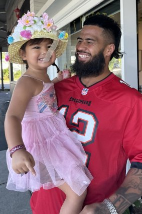 Payne Haas with his daughter Lalita.