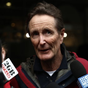 Media Watch Presenter Paul Barry speaks to media as the Australian Federal Police raid the ABC.