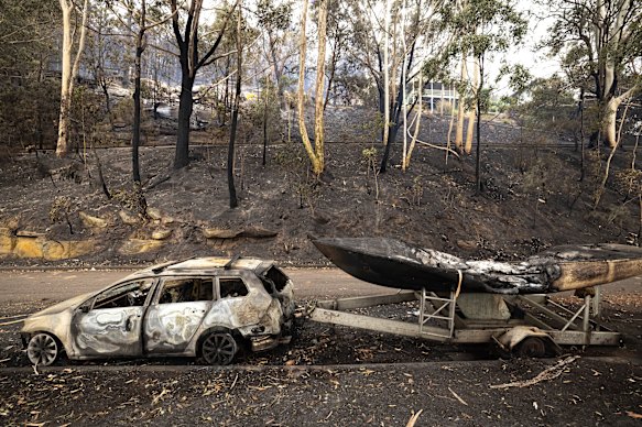 Damage by the Koolewong bushfire is evident along roads through the area.