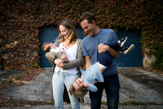Kristy and Andrew Pownall with their children, Noah, 2 and newborn Grace, who were both conceived through IVF.