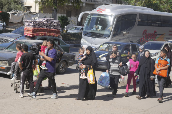 Palestinians fleeing to the southern Gaza Strip following Israel’s evacuation order.