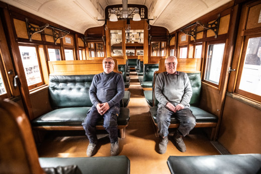Same train of thought: Volunteers Tom Clark (left) and twin brother Kevin inside the vintage Red Rattler train.