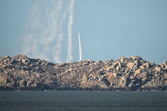 Chinese soldiers fire rockets as part of military drills on Pingtan island, the closest point to Taiwan.