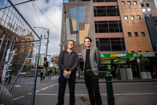 Still standing: Richard Beck’s son Chris and City of Melbourne councillor Rohan Leppert in front of his 1956 mosaic design.