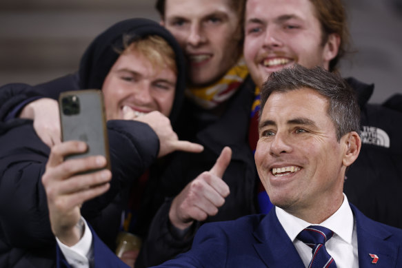 Former Richmond champion Matthew Richardson, posing with fans last year, is from Tasmania.