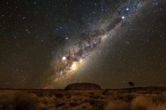 Uluru under the night sky.
