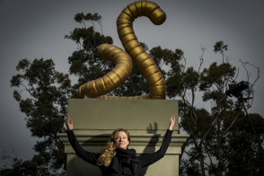 All hail: sculptor Kathy Holowko with her sculpture The Unsung Hero in Edinburgh Gardens, Fitzroy North.